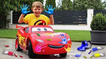 Messy Painting Fun: Little Boy’s Colorful Day with McQueen